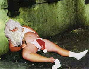 Santa Claus drunk in the gutter