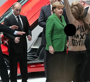 vladimir putin thumbs up naked femen protester