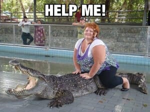 obese woman sitting on alligator
