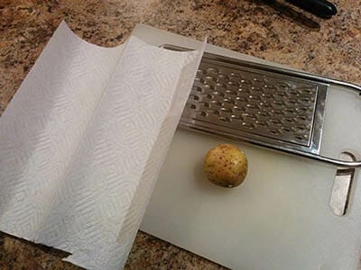 potato, cheese grater, paper towel