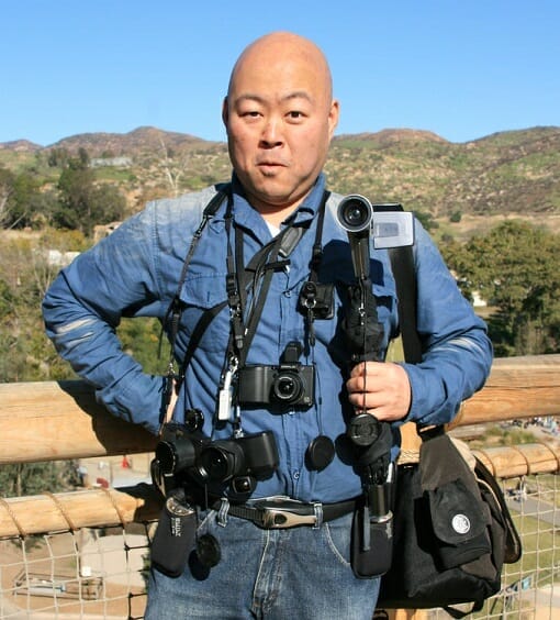 Japanese tourist with many cameras